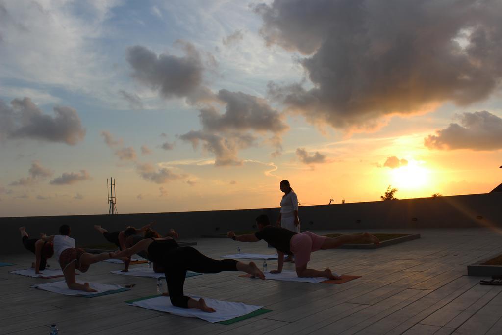 Ts Suites Seminyak  Exterior photo Sunset yoga at the rooftop of the hotel